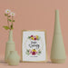 Free 3D Ornaments And Hello Spring Card On Table Psd