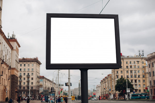 Free A Large Billboard With Interesting Information And Advertising On It Installed Along A Wide Street In The City Center Psd