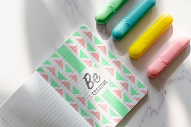 Free Agenda With Markers Beside On Desk Psd