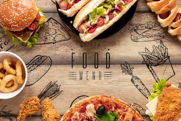 Free Arrangement Of Fast Food On Wooden Background Psd