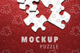 Free Arrangement With Puzzle Pieces On Red Background Psd
