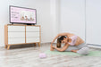 Free Athletic Woman Doing Yoga At Home Psd