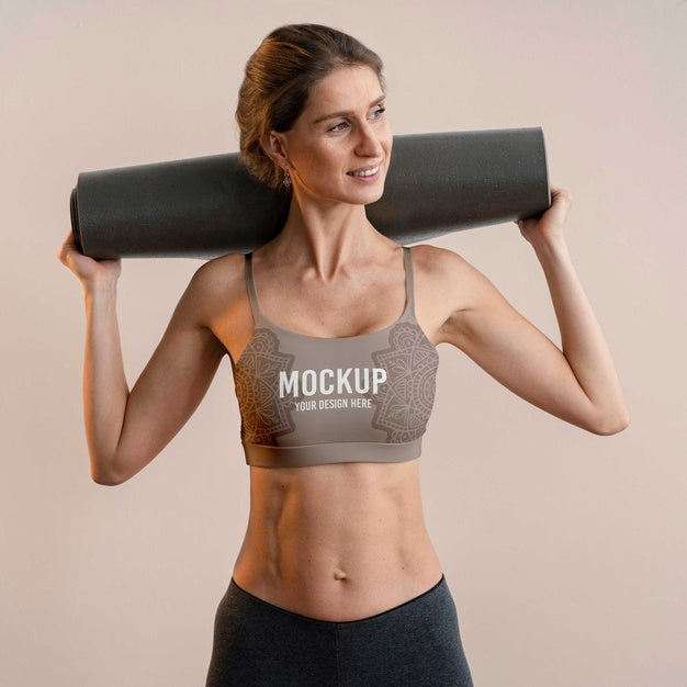 Free Athletic Woman Holding Yoga Mat Psd