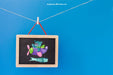 Free Baby Mockup With Slate Hanging On Clothes Peg Psd
