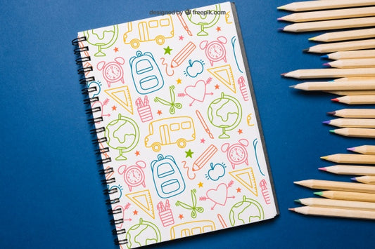 Free Back To School Mockup With Notepad And Pencils Psd