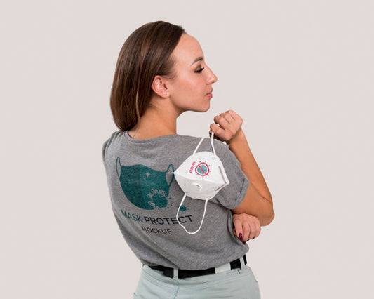 Free Back View Of Woman Holding Mask Over Her Shoulder Psd