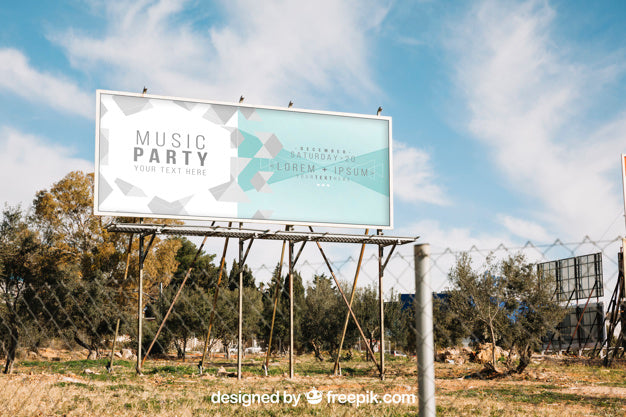 Free Billboard Mockup Behind Metal Fence Psd
