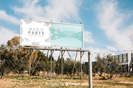 Free Billboard Mockup Behind Metal Fence Psd