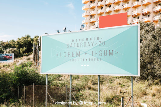 Free Billboard Mockup In Front Of Big Building Psd