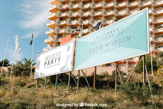 Free Billboard Mockup In Front Of Tall Building Psd