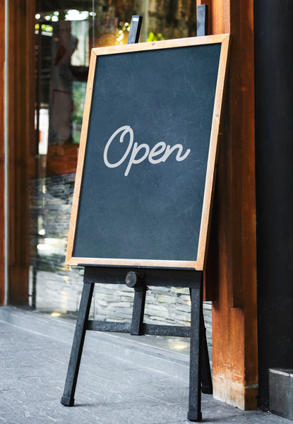 Free Blackboard Sign Mockup In Front Of A Restaurant Psd