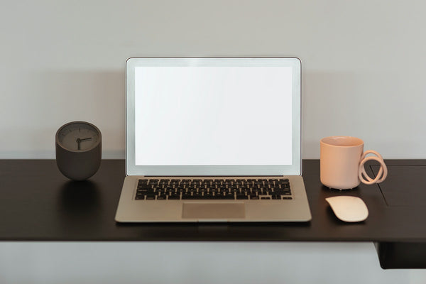 Free Blank Laptop Screen And A Pink Coffee Cup