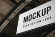 Free Board Mockup Hanging At A Train Station Psd