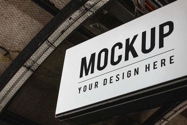 Free Board Mockup Hanging At A Train Station Psd