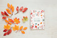Free Branches Of Dried Leaves And Notepad Psd