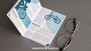 Free Brochure Mockup With Glasses Psd