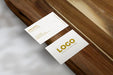 Free Business Cards Over Wood Surface Mockup Psd