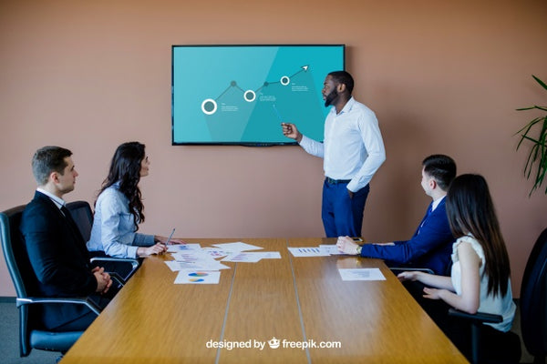 Free Business Meeting With Tv Mockup Psd