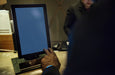 Free Business People Discussing About Work Using Tablet Psd