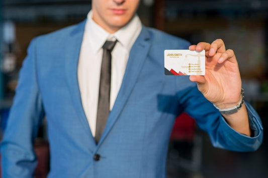 Free Businessman Showing Business Card Mockup Psd