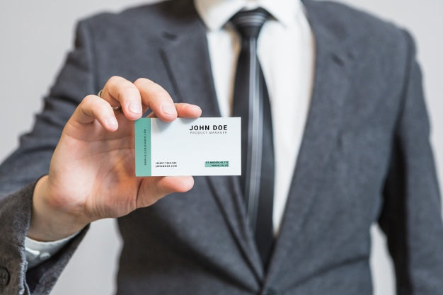 Free Businessman Showing Business Card Psd