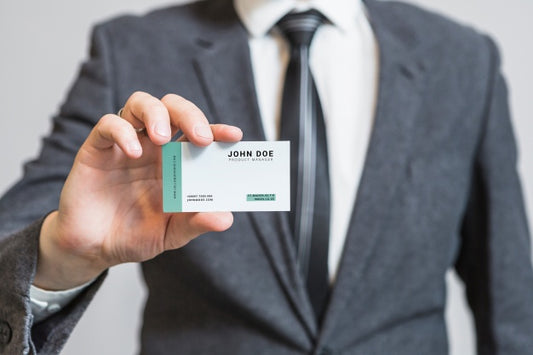 Free Businessman Showing Business Card Psd