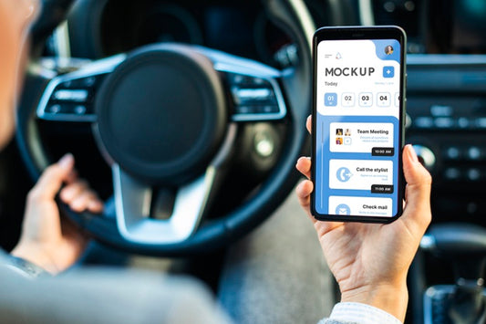 Free Businesswoman In Car Holding Phone Mockup Psd