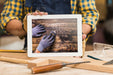 Free Carpenter Holding Tablet Mockup Psd