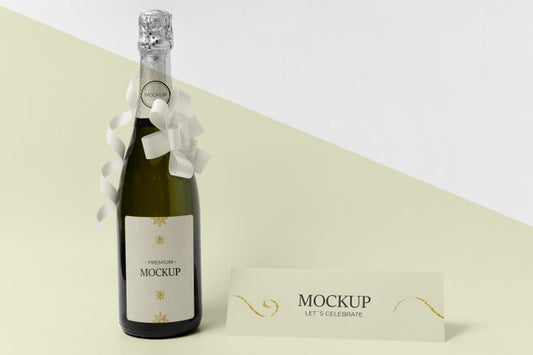 Free Champagne Bottle Mock-Up With White Ribbons And Bows Psd
