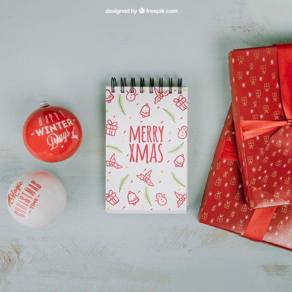 Free Christmas Mockup With Notepad And Gift Boxes Psd