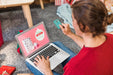 Free Christmas Sale Mockup With Woman Using Laptop Psd