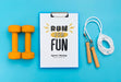 Free Clipboard With Jumping Rope And Weights Beside Psd
