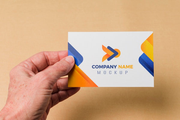 Free Close-Up Hand Holding Business Card Mock-Up Psd