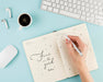 Free Close-Up Hand With Pen And Notebook Psd