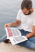 Free Close Up Man On Street Reading Book Psd