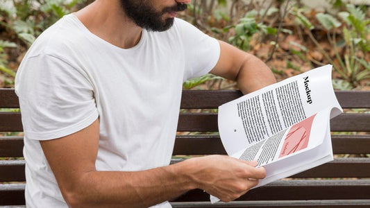 Free Close Up Man On Street Reading Book Psd