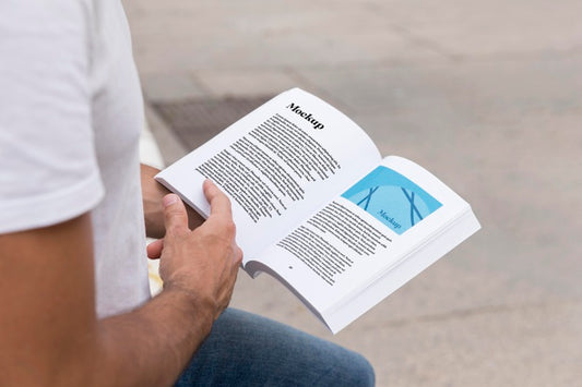 Free Close Up Man On Street Reading Book Psd