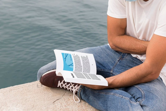 Free Close Up Man On Street Reading Book Psd