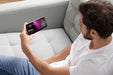 Free Close Up Man Watching Movie On Smartphone Psd