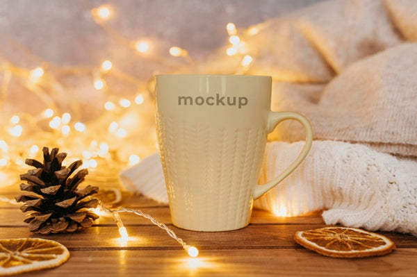 Free Close Up On Cup Mockup Design Near Festive Lights Psd