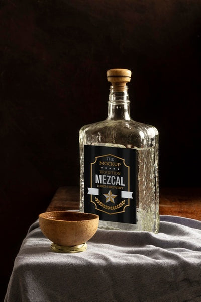Free Close Up On Mezcal Drink Bottle With Glasses Psd