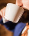 Free Coffee Cup And A Man In A Suit Mockup