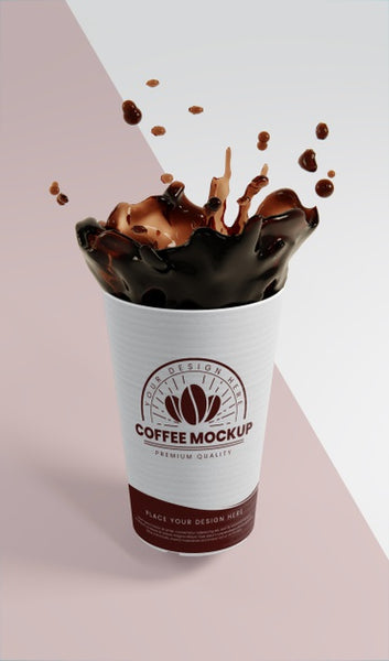 Free Composition Of Paper Coffee Cup With Coffee Splash Psd