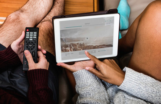 Free Couple Checking Music Playlist On Tablet Psd