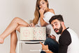 Free Couple Presenting Open Book Psd
