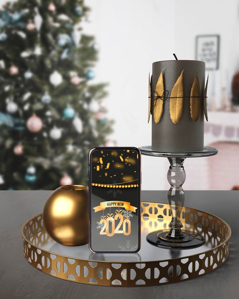 Free Decorations On Tray Beside Phone With Message For New Year Psd