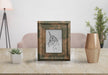 Free Decorative Frame Mockup On Table At Home Psd