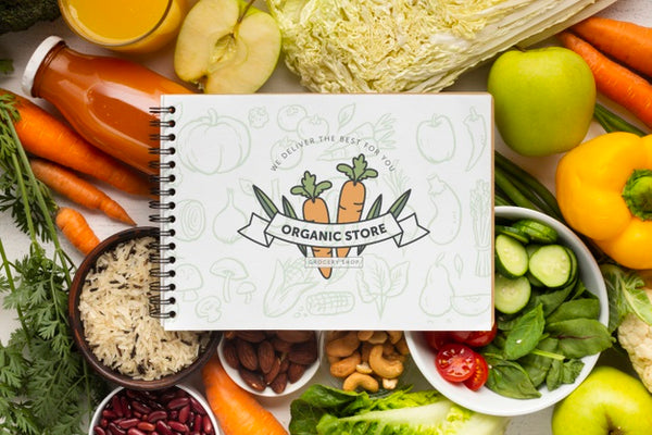 Free Delicious Fresh Vegetables With Notebook On Top Psd