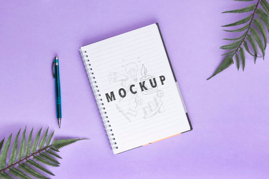 Free Desk Concept With Notebook And Pen On Table Psd