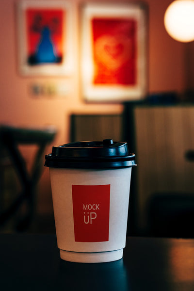 Free Disposable Coffee Paper Cup Mockup Design